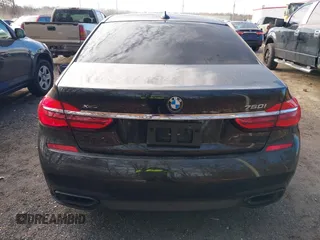 2019 BMW 7 Series 750i xDrive with VIN WBA7F2C52KB240302, listed as a IAAI auction lot 40984933 with 93,737 mi miles and . Bid and sale history available at DreamBid. Image 16.