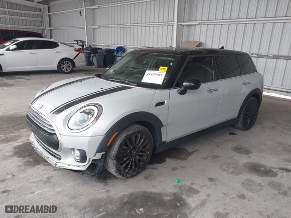 2019 MINI Cooper Clubman with VIN WMWLN5C53K2E34830, listed as a IAAI auction lot 41419983 with 64,716 mi miles. Bid and sale history available at carsss.com. Image 2.