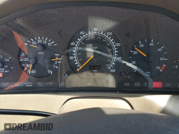 1997 Mercedes-Benz SL 500 z VIN WDBFA63F4VF151890, wystawiony jako Copart lot #53715385 z przebiegiem 165 459 mil mil oraz Czysty tytuł • Clean title. Historia ofert i sprzedaży dostępna na DreamBid. Obrazek 9.