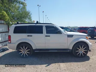 2011 Dodge Nitro Heat with VIN 1D4PT4GX9BW587284, listed as a IAAI auction lot 41998357 with 100,366 mi miles and . Bid and sale history available at DreamBid. Image 13.