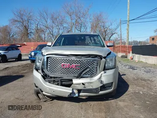 2016 GMC Yukon Denali with VIN 1GKS2CKJ5GR393269, listed as a IAAI auction lot 41963630 with 158,584 mi miles and . Bid and sale history available at DreamBid. Image 12.
