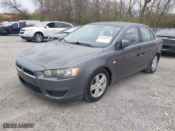 2008 Mitsubishi Lancer DE with VIN JA3AU26U48U012900, listed as a IAAI auction lot 41988059 with 216,797 mi miles. Bid and sale history available at carsss.com. Image 2.