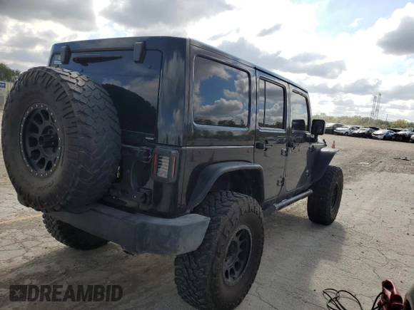 2014 Jeep Wrangler Unlimited Rubicon X с VIN 1C4HJWFG0EL142071, выставлен на аукционе Copart как лот 72898994 с пробегом 110 597 миль миль и Списание • Salvage title. История ставок и продаж доступна на DreamBid. Изображение 3.