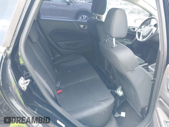 2016 Ford Fiesta SE with VIN 3FADP4EJ2GM150453, listed as a IAAI auction lot 42104235 with 124,423 mi miles and . Bid and sale history available at carsss.com. Image 8.