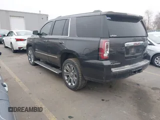 2015 GMC Yukon Denali with VIN 1GKS2CKJ2FR705806, listed as a IAAI auction lot 41568322 with 171,011 mi miles. Bid and sale history available at carsss.com. Image 3.