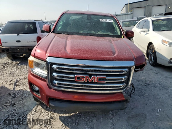 2015 GMC Canyon 2WD SLE with VIN 1GTH5BEA0F1190810, listed as a Copart auction lot 69724194 with 238,397 mi miles and Salvage Title. Bid and sale history available at carsss.com. Image 5.
