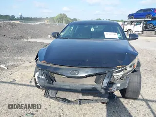 2014 Kia Optima EX with VIN 5XXGN4A70EG277871, listed as a IAAI auction lot 42183248 with 128,300 mi miles and . Bid and sale history available at carsss.com. Image 16.