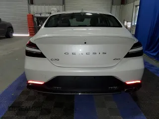 2023 Genesis G70 2.0T with VIN KMTG34TAXPU131832, listed as a Copart auction lot 44111124 with 3,203 mi miles and Non Repairable. Bid and sale history available at DreamBid. Image 6.