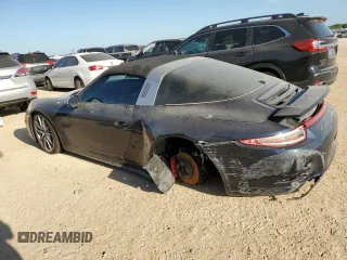 2015 Porsche 911 4S z VIN WP0BB2A97FS135050, wystawiony jako Copart lot #52713065 z przebiegiem 41 879 mil mil oraz Szkoda całkowita • Salvage title. Historia ofert i sprzedaży dostępna na DreamBid. Obrazek 2.