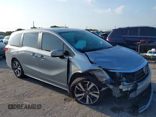 2023 Honda Odyssey Touring with VIN 5FNRL6H86PB020700, listed as a IAAI auction lot 41961098 with 66,512 mi miles and . Bid and sale history available at DreamBid. Image 1.