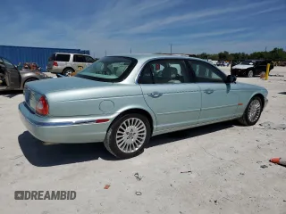 2005 Jaguar XJ Vanden Plas z VIN SAJWA82CX5SG35644, wystawiony jako Copart lot #49029245 z przebiegiem 88 771 mil mil oraz Szkoda całkowita • Salvage title. Historia ofert i sprzedaży dostępna na DreamBid. Obrazek 3.