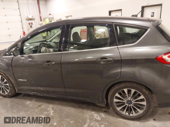 2018 Ford C-Max Titanium with VIN 1FADP5DU5JL101340, listed as a IAAI auction lot 41816730 with 102,207 mi miles and . Bid and sale history available at DreamBid. Image 14.