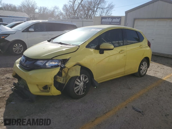 2015 Honda Fit LX with VIN 3HGGK5H51FM717584, listed as a Copart auction lot 87038334 with 143,447 mi miles and Salvage Title. Bid and sale history available at carsss.com. Image 1.