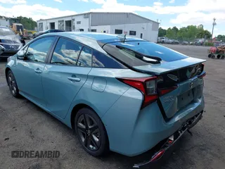 2019 Toyota Prius L Eco z VIN JTDKARFU8K3095669, wystawiony jako IAAI lot #42334160 z przebiegiem 59 882 mil mil oraz . Historia ofert i sprzedaży dostępna na DreamBid. Obrazek 3.