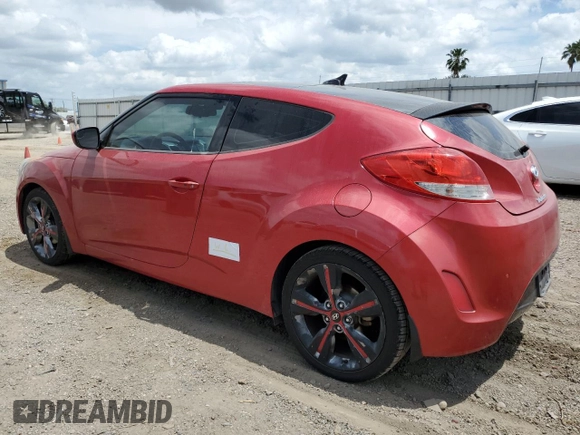 2016 Hyundai Veloster z VIN KMHTC6AD4GU294400, wystawiony jako Copart lot #52755575 z przebiegiem 108 419 mil mil oraz Szkoda całkowita • Salvage title. Historia ofert i sprzedaży dostępna na DreamBid. Obrazek 2.