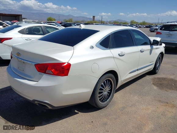 2014 Chevrolet Impala LTZ with VIN 2G1155S31E9258382, listed as a IAAI auction lot 41949581 with 100,101 mi miles. Bid and sale history available at carsss.com. Image 4.
