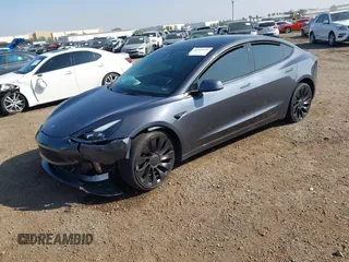 2022 Tesla Model 3 Performance with VIN 5YJ3E1ECXNF264830, listed as a IAAI auction lot 41625494 with Not Provided miles and . Bid and sale history available at carsss.com. Image 2.
