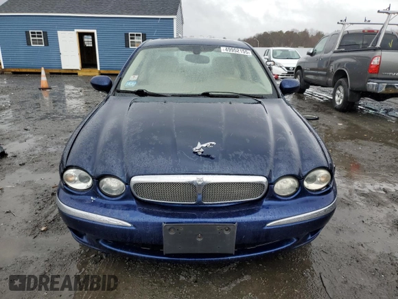 2004 Jaguar X-Type with VIN SAJEA51C74WE00833, listed as a Copart auction lot 49952155 with 109,254 mi miles and Non Repairable. Bid and sale history available at DreamBid. Image 5.