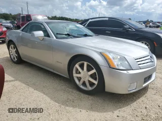 2006 Cadillac XLR z VIN 1G6YV36A365601441, wystawiony jako Copart lot #73945994 z przebiegiem Nie podano mil oraz Szkody całkowita. Historia ofert i sprzedaży dostępna na DreamBid. Obrazek 4.
