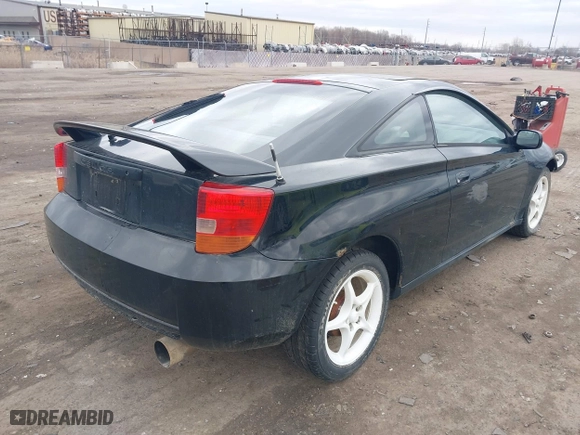 2000 Toyota Celica GT with VIN JTDDR32T7Y0006809, listed as a IAAI auction lot 41860933 with 262,014 mi miles. Bid and sale history available at carsss.com. Image 4.
