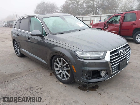 2018 Audi Q7 Premium Plus with VIN WA1LHAF70JD040387, listed as a IAAI auction lot 41087797 with 75,031 mi miles. Bid and sale history available at carsss.com. Image 1.