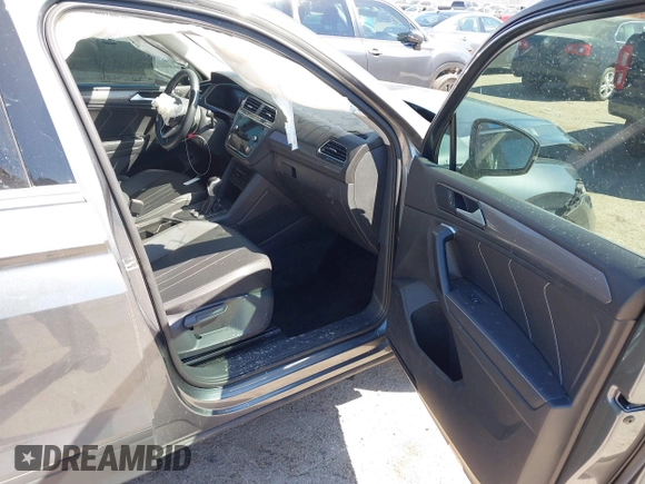 2023 Volkswagen Tiguan SE with VIN 3VV3B7AX5PM142378, listed as a IAAI auction lot 41835204 with 13,670 mi miles and . Bid and sale history available at DreamBid. Image 5.