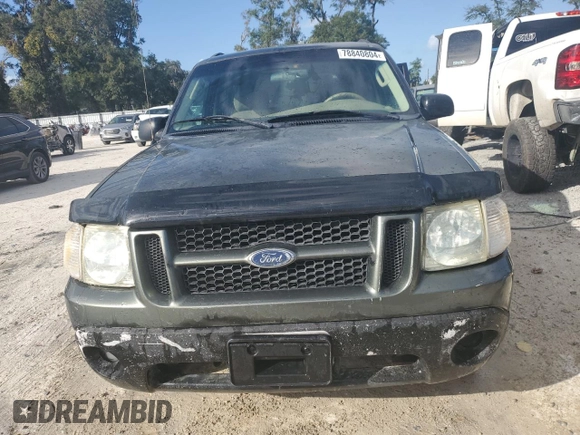 2003 Ford Explorer Sport XLS z VIN 1FMYU60EX3UA56154, wystawiony jako Copart lot #82259834 z przebiegiem 188 417 mil mil oraz Szkody całkowita. Historia ofert i sprzedaży dostępna na DreamBid. Obrazek 5.