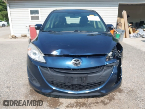 2015 Mazda 5 Sport z VIN JM1CW2BL9F0187973, wystawiony jako IAAI lot #42378711 z przebiegiem 97 543 mil mil oraz . Historia ofert i sprzedaży dostępna na DreamBid. Obrazek 12.