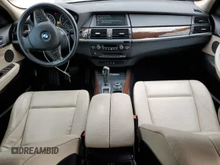 2012 BMW X5 35i с VIN 5UXZV4C5XCL749123, выставлен на аукционе Copart как лот 65259585 с пробегом 124 193 миль миль и Чистый • Clean title. История ставок и продаж доступна на DreamBid. Изображение 8.