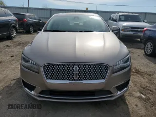 2018 Lincoln MKZ Select z VIN 3LN6L5D90JR628225, wystawiony jako Copart lot #54855245 z przebiegiem 56 292 mil mil oraz Szkody całkowita. Historia ofert i sprzedaży dostępna na DreamBid. Obrazek 5.