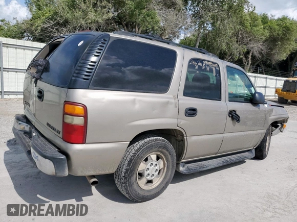 2002 Chevrolet Tahoe LS z VIN 1GNEC13V92R136479, wystawiony jako Copart lot #59803055 z przebiegiem 165 718 mil mil oraz Czysty tytuł • Clean title. Historia ofert i sprzedaży dostępna na DreamBid. Obrazek 3.