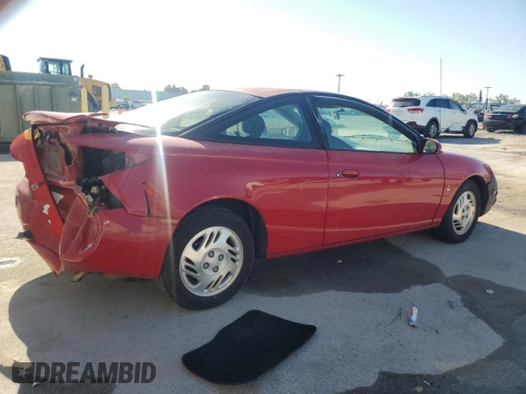 2001 Saturn SC z VIN 1G8ZY12711Z207035, wystawiony jako Copart lot #48784935 z przebiegiem 162 397 mil mil oraz Szkody całkowita. Historia ofert i sprzedaży dostępna na DreamBid. Obrazek 3.