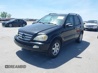 2004 Mercedes-Benz M 350 with VIN 4JGAB57E64A506988, listed as a IAAI auction lot 42219772 with 294,505 mi miles and . Bid and sale history available at DreamBid. Image 2.