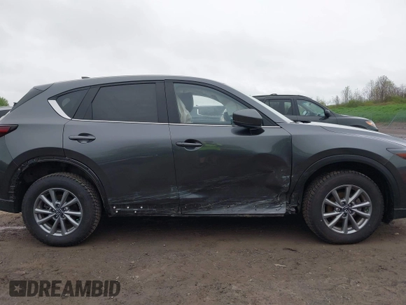 2023 Mazda CX-5 S Select with VIN JM3KFBBM4P0228412, listed as a IAAI auction lot 42194856 with 31,708 mi miles and . Bid and sale history available at carsss.com. Image 13.