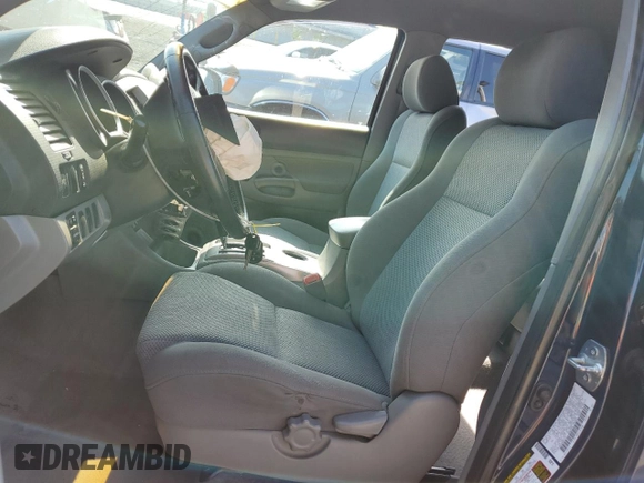 2008 Toyota Tacoma PreRunner with VIN 3TMJU62N48M059131, listed as a Copart auction lot 60751455 with 125,672 mi miles and Salvage title. Bid and sale history available at DreamBid. Image 7.