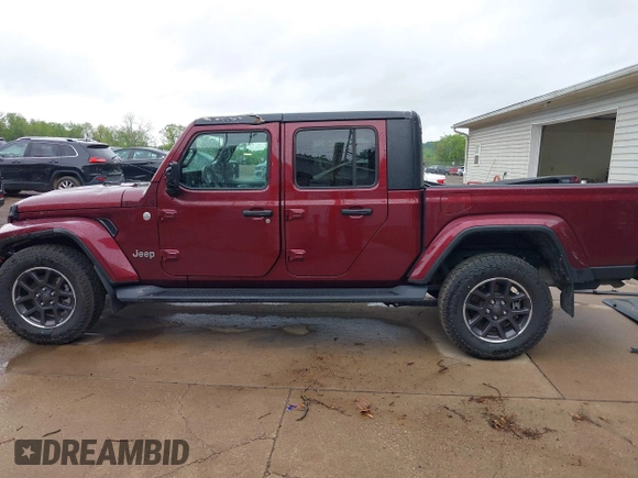 2021 Jeep Gladiator Overland with VIN 1C6HJTFGXML555622, listed as a IAAI auction lot 42237686 with 62,358 mi miles and . Bid and sale history available at DreamBid. Image 14.