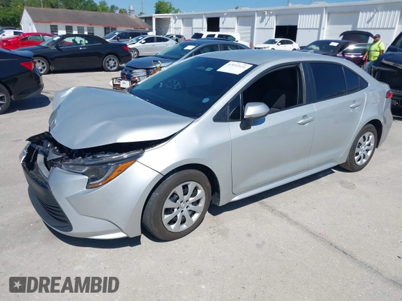2023 Toyota Corolla LE with VIN 5YFB4MDE8PP053698, listed as a IAAI auction lot 42052631 with 26,766 mi miles. Bid and sale history available at carsss.com. Image 2.