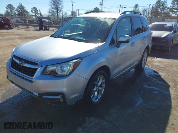 2017 Subaru Forester Touring with VIN JF2SJAWC8HH532348, listed as a IAAI auction lot 41304804 with 104,221 mi miles and . Bid and sale history available at DreamBid. Image 17.