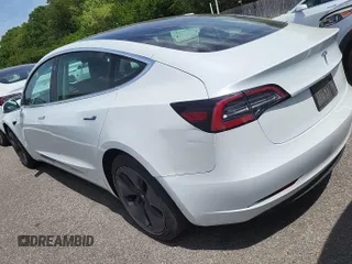 2020 Tesla Model 3 Long Range with VIN 5YJ3E1EB2LF636956, listed as a IAAI auction lot 42184431 with 61,776 mi miles and . Bid and sale history available at DreamBid. Image 1.