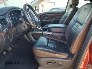 2016 Nissan Titan Platinum Reserve с VIN 1N6BA1F21GN502062, выставлен на аукционе Copart как лот 50461405 с пробегом 95 018 миль миль и Списание • Salvage title. История ставок и продаж доступна на DreamBid. Изображение 7.