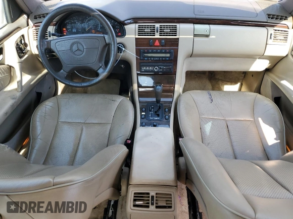 1997 Mercedes-Benz E-Class with VIN WDBJF55F8VJ031008, listed as a Copart auction lot 74305684 with 308,905 mi miles and Clean Title. Bid and sale history available at carsss.com. Image 8.