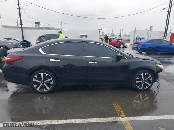 2018 Nissan Altima 2.5 SV with VIN 1N4AL3AP9JC117719, listed as a IAAI auction lot 41720521 with 103,541 mi miles. Bid and sale history available at carsss.com. Image 14.