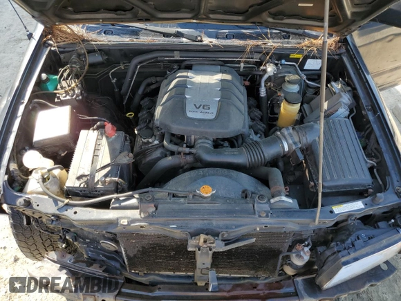 2000 Isuzu Rodeo S with VIN 4S2CK58W7Y4309261, listed as a Copart auction lot 54000775 with 187,949 mi miles and Salvage title. Bid and sale history available at DreamBid. Image 12.