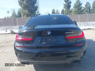 2022 BMW 3 Series M340i with VIN 3MW5U7J02N8C22521, listed as a IAAI auction lot 41776890 with 66,055 mi miles. Bid and sale history available at carsss.com. Image 16.