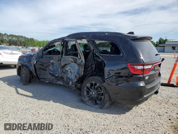 2021 Dodge Durango GT with VIN 1C4RDHDG6MC825093, listed as a Copart auction lot 56124395 with 59,712 mi miles and Salvage title. Bid and sale history available at DreamBid. Image 2.