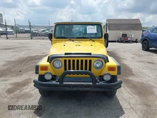 2004 Jeep Wrangler Sport z VIN 1J4FA49S04P701986, wystawiony jako IAAI lot #42256648 z przebiegiem 129 946 mil mil oraz . Historia ofert i sprzedaży dostępna na DreamBid. Obrazek 12.