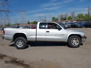2001 Dodge Dakota SLT with VIN 1B7GG22XX1S348751, listed as a IAAI auction lot 42077395 with 148,034 mi miles and . Bid and sale history available at carsss.com. Image 14.