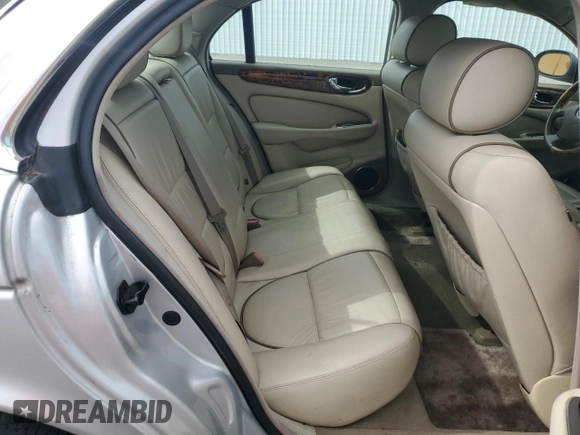 2004 Jaguar XJ Vanden Plas with VIN SAJWA74C04SG25291, listed as a Copart auction lot 56678255 with 176,597 mi miles and Clean Title. Bid and sale history available at DreamBid. Image 10.