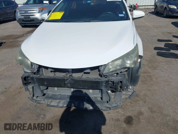 2015 Toyota Camry XLE with VIN 4T1BF1FK2FU001539, listed as a IAAI auction lot 41958674 with 163,758 mi miles and . Bid and sale history available at DreamBid. Image 12.