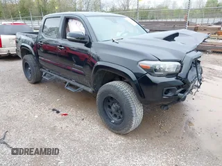2018 Toyota Tacoma SR with VIN 3TMCZ5AN0JM136198, listed as a IAAI auction lot 41962668 with 71,813 mi miles. Bid and sale history available at carsss.com. Image 1.
